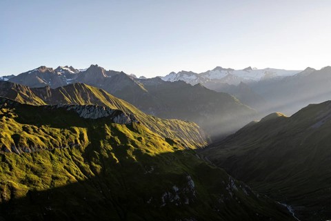 Mountain landscape at sunrise, view of mountain peaks of the Venediger group and into the