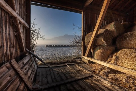 Barn, hut, hay bales, interior shot, morning light, fog, winter, mountains, Loisach-Lake Kochel