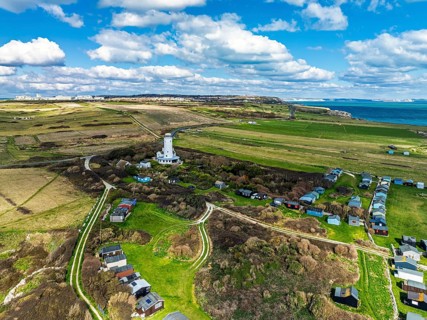 Portland Bird Observatory from a drone, Bill Lighthouse, Portland Bill, Isle of Portland, Dorset,