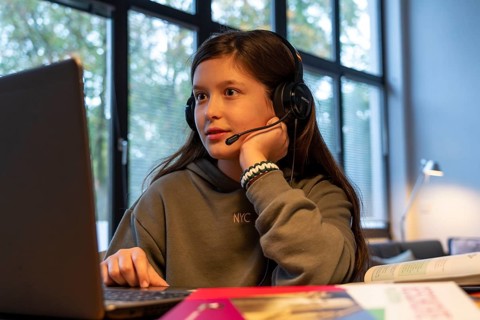 Homeschooling, girl, 11 years old, learns at home, home learning, lessons at home, distance