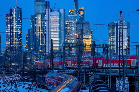 Railway tracks in front of the main railway station in Frankfurt am Main, skyline of skyscrapers in