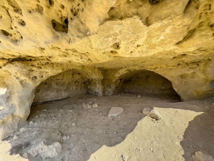 Cave of former Roman necropolis with burial caves carved in sandstone Cave tombs Grottoes in rocks