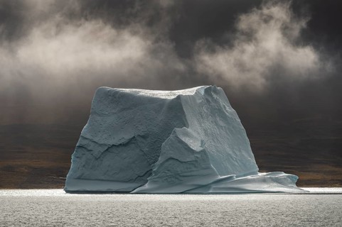 Floating iceberg, Scoresbysund or Kangertittivaq in Greenlandic, the largest and longest fjord