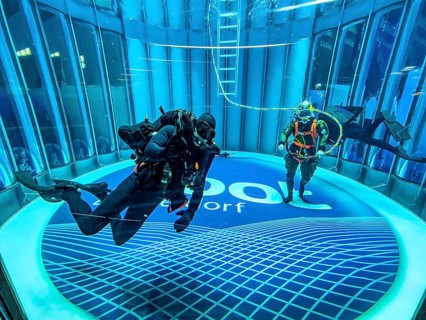 View into diving tower of Messe boot Düsseldorf, on the left recreational diver, on the right