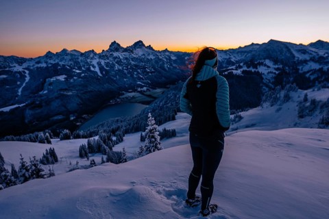 Hiking in the snow in the snow-covered winder landscape in the Alps at Neunerköpfle in the