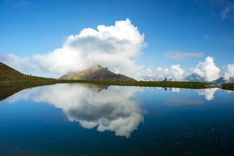 Artificially created lake, snow pond, feeds the snow cannons that completely cover the slopes of