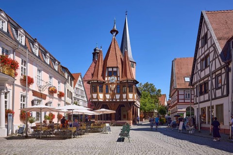 Historic town hall on the market square under a cloudless blue sky in Michelstadt, Odenwald,
