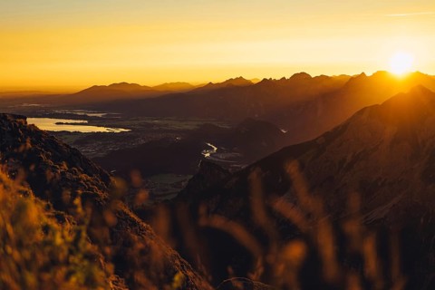 View from the Aggenstein and the foothills of the Alps in Ostallgäu and the Ammergebirge at