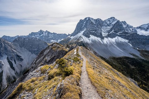 Hiking trail on the ridge of the Hahnkampl, mountain panorama with steep rocky peaks, view of