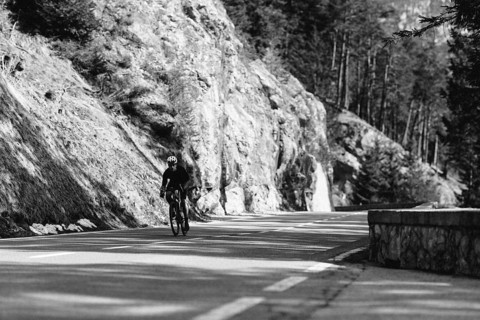 Road bike rider in spring between Lechtal and Tannheimer Tal in front of picturesque scenery of the