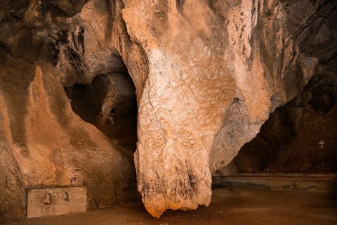 Dramatic limestone formation in a cave with strong textures, Church of Mary the Fountain of Life,