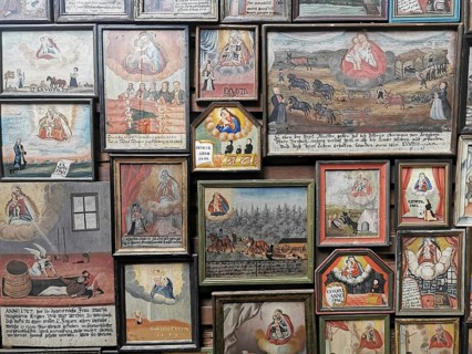 Votive pictures, votive tablets on the walls of the chapel of grace inside the church, pilgrimage