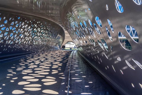 Light effects from the sun in the Parkbruk, a cycle and pedestrian bridge in the city centre of