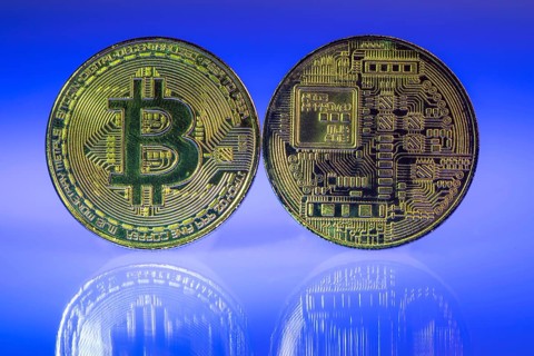 Bitcoin, cryptocurrency, symbol coin, optical placeholder for the digital currency, front and back,