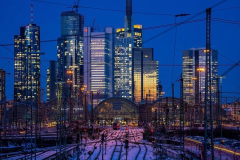Railway tracks in front of the main railway station in Frankfurt am Main, skyline of skyscrapers in