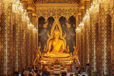 The revered Buddha statue Phra Putthachinnarat in Sukhothai style in the temple Wat Phra Si Rattana