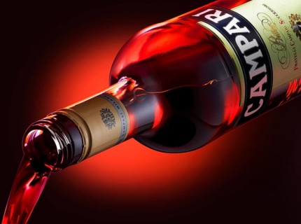 Campari is poured from the bottle