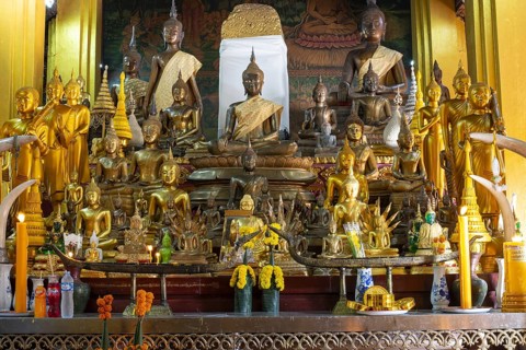 Numerous Buddhas and the city pillar, which is considered the home of the city's protective spirit,