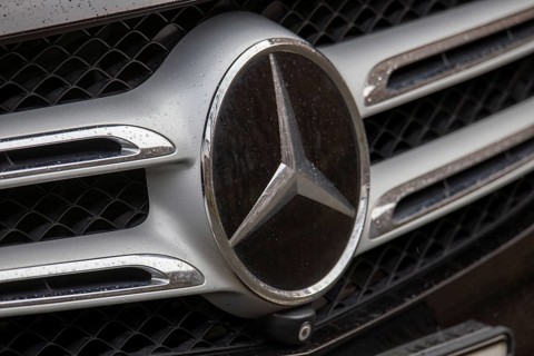 Close-up of the Mercedes star on the radiator grille