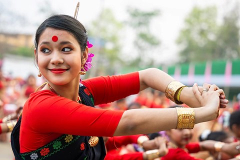 Participants with an instructor dance on the final day of a Bihu dance workshop ahead of Rongali