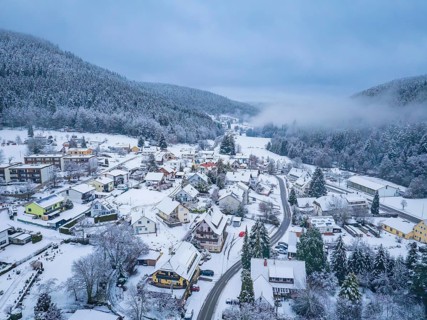 Dreamy village in a wintry and misty forest landscape, Enzklösterle, Calw district, Black Forest,