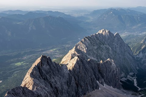 Steep rocky ridge, Waxensteinkamm, with summit Waxenstein, in the evening light, view from the
