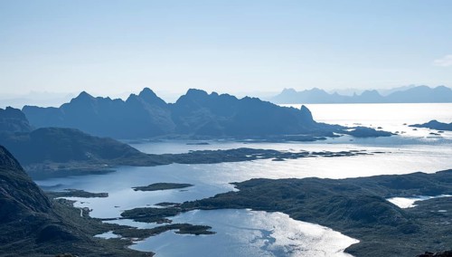 Mountain peak and fjord Austensfjorden, fjord landscape and sea, view from the summit of
