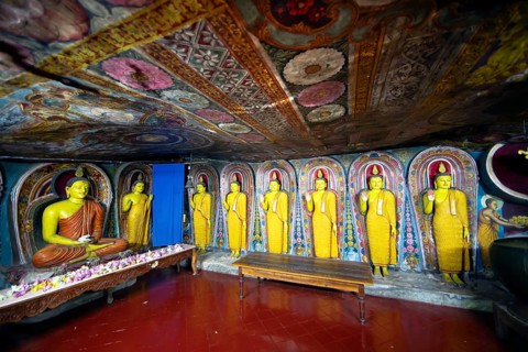 Buddha figures in the Aluvihara Rock Cave Temple or Cave Monastery, Aluvihara, Matale, Central