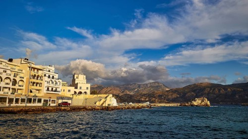 Morning light, A beautiful coastal town with harbour and mountains in the background, Pigadia, town