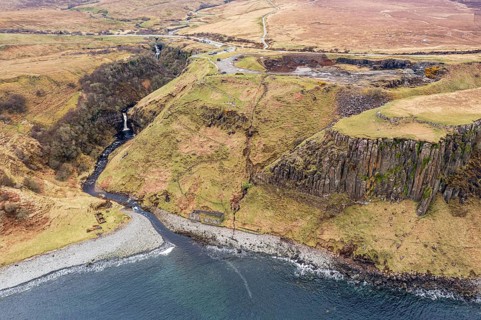 Aerial view of Lealt waterfall and basalt cliff near Staffin, Isle of Skye, Scotland, UK