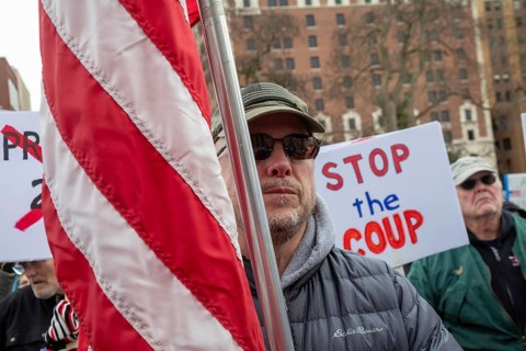 Lansing, Michigan USA - 5 February 2025 - People rally at the Michigan state capitol to oppose