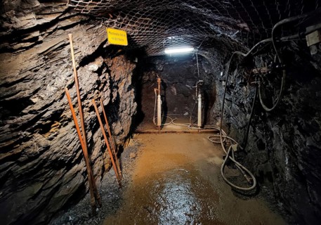 Mechanical drilling with a hammer drill in the Rammelsberg visitor mine, UNESCO World Heritage