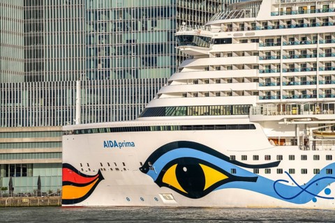 Rotterdam, skyline at the Nieuwe Maas, skyscrapers at the Kop van Zuid district, cruise ship Aida