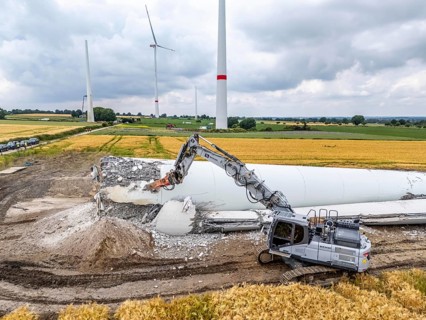 Demolished tower of a 20 year old wind turbine, in the Werl wind farm, 5 old Enercon E-66 turbines