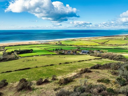 Farms over Swyre and West Bexington from a drone, West Bexington Nature Reserve, S W Coast Path,