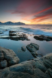 Sunset in winter at Skagsanden, rock formations on the beach at Flakstad, Flakstadøy, Lofoten,