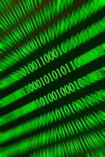 Swirling green binary numbers with blurring, techno-like representation