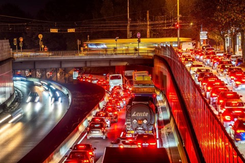 Evening traffic, partly with congestion, slow-moving traffic on the A40 motorway, traffic jam