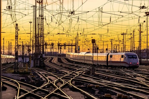 Track apron with trains, rails, points, pylons and signalling systems. Infrastructure at the main