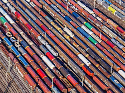 Deutsche Bahn AG marshalling yard. Many goods trains are parked on the tracks with tank wagons, car