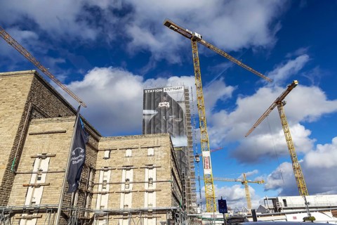 Construction site Stuttgart 21. heritage-protected Bonatz building with crane. Stuttgart,