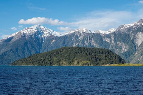 Mountain range at southern shore of Lake Lago Yelcho, along road 235 connecting Futaleufu with the