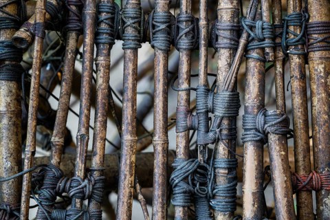 Close-up of a complex bamboo installation with ropes, bamboo sculpture by Doug and Mike Starn, art