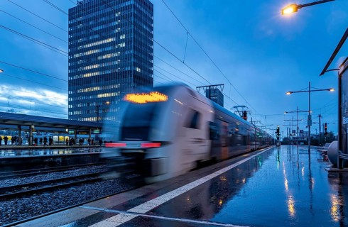 RRX train, regional express, Rhine-Ruhr-Express, train traffic, city centre skyline, Essen central