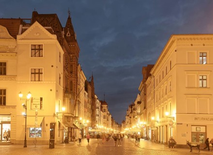 The medieval old town of Thorn illuminated in the evening. The historic city centre of Torun is a