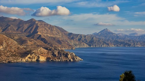 Panorama of mountains and sea in sunny weather, morning light, sunrise, coastal road, east coast,