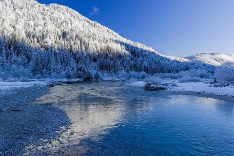Isar valley in winter at temperatures of minus 18 degrees Celsius. Snow covered landscape with the