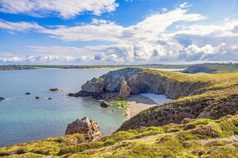 Scenics view at a rocky coastline with sea bays on the french west coast from a heath a sunny