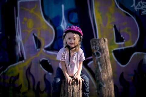 Little girl, 3 years, blonde, climbing, post, climbing facility, climbing frame, in front of wall