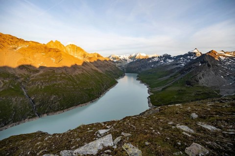 Picturesque mountain landscape at the summit Mont de la Blana at sunset, view of blue mountain
